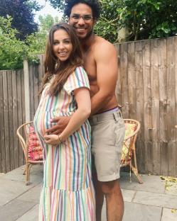 Pregnant Louisa Lytton and her partner.