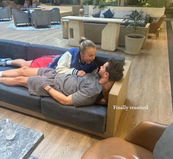 Chris Hughes and JoJo Siwa reunited on a couch.