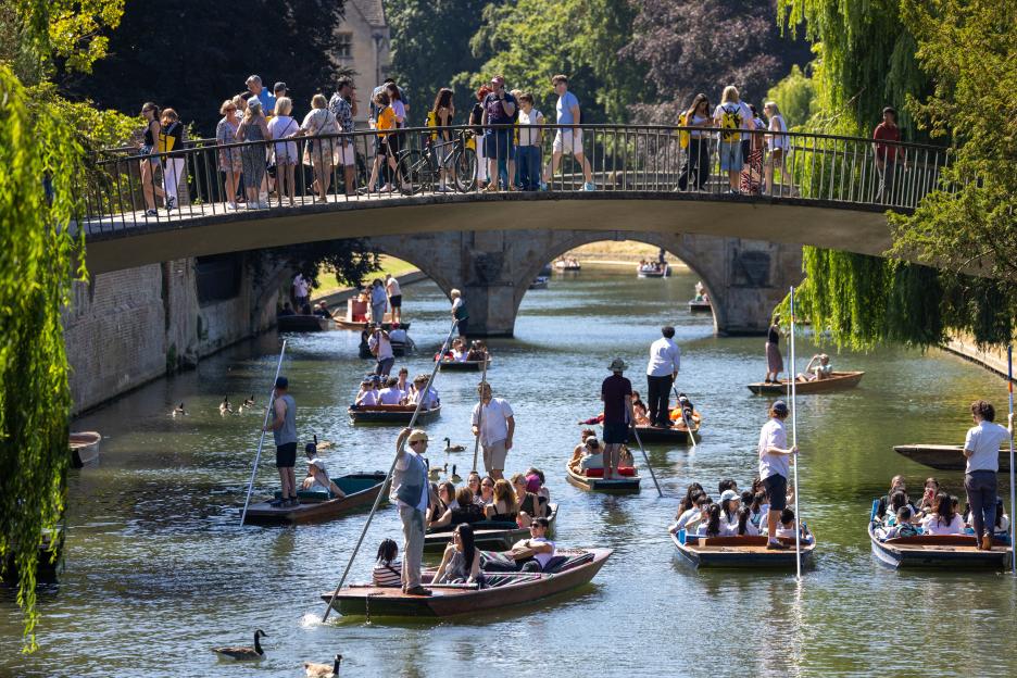 People punting on the River Cam in Cambridge during a heatwave.