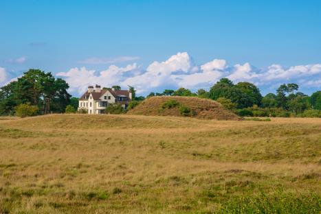 View of an Anglo-Saxon burial mound at Sutton Hoo, England.