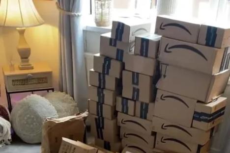 Lad shows off epic haul of parcels after asking for help decorating council flat but gets torn apart for ‘begging’