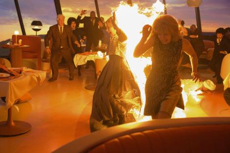 Scene from Final Destination Bloodlines showing a woman on fire in a restaurant.