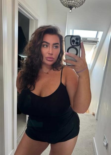 Selfie of Lauren Goodger in black lingerie.