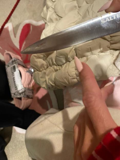 Close-up of a hand injury with a knife.