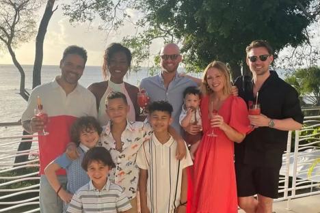 Noughties girlband star, 43, has barely aged a day as she celebrates birthday on holiday with pop star pal and family