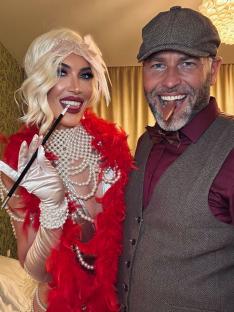 Amanda Leigh and Alex Christian in 1920s-style costumes.