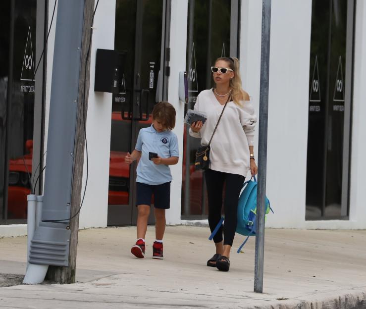 Anna Kournikova walking with her son, Nicholas, in Miami.
