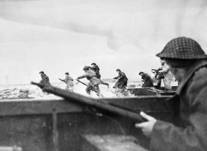 Canadian soldiers landing on Courseulles beach during D-Day.