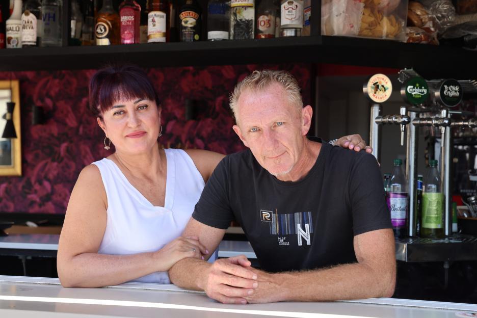 Portrait of a bar's co-owners, Andy Inman and Mayka Sanchez.