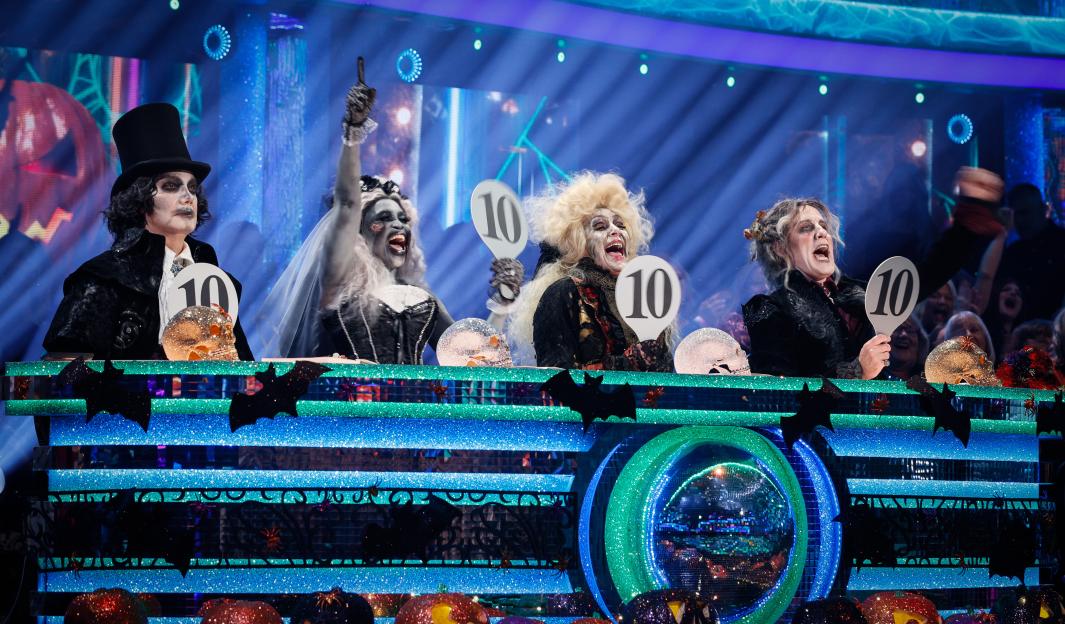 Strictly Come Dancing judges Craig Revel Horwood, Motsi Mabuse, Shirley Ballas, and Anton Du Beke dressed in Halloween costumes.