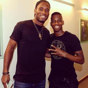 Charly Musonda and Didier Drogba together.