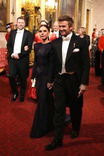 David and Victoria Beckham at Buckingham Palace.