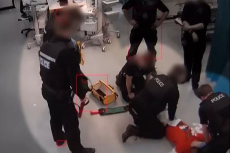 Shock moment cops kill handcuffed patient, 24, by throwing him around ‘like a rag doll’ as he lay on hospital ward floor