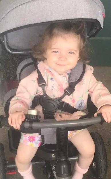 Girl, 2, ‘murdered at home’ is pictured as devastated family pay tribute – with man, 21, and woman, 25, arrested