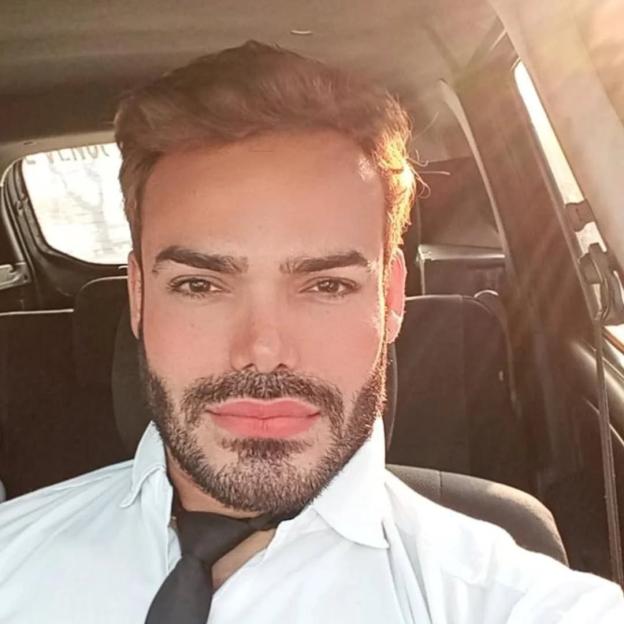 Emilio Sueños, a TV star, model, and presenter, looks at the camera while sitting in a car.