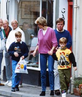 Princess Diana with Princes William and Harry shopping.