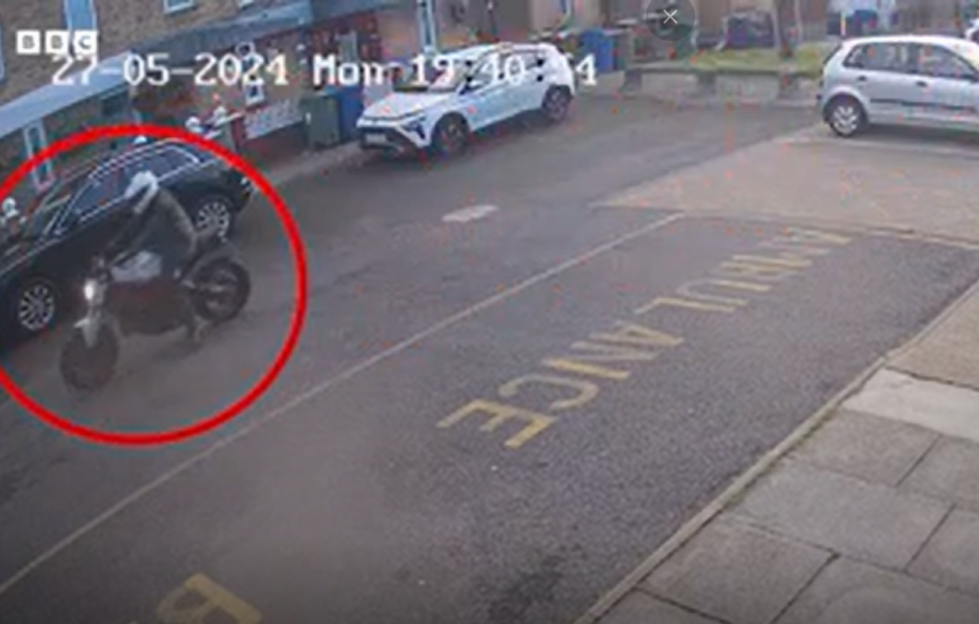 Screengrab of a person on a motorcycle, circled, from Met Police video.