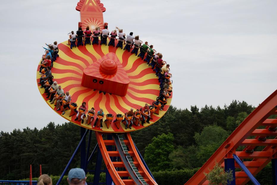 People riding the Edge Megadisk-O ride at Paultons Park.