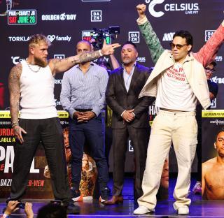 Jake Paul and Julio Cesar Chavez Jr. at a press conference.