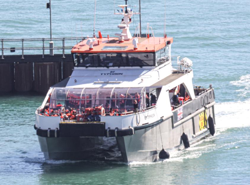 Boat carrying migrants arriving at the Port of Dover.