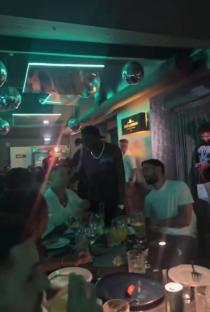Bruno Fernandes and Joao Cancelo at a restaurant.