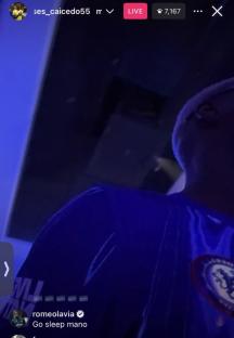 Screenshot of a live Instagram video showing a person wearing a blue shirt.