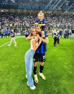 Francesco Acerbi with his family on a soccer field.