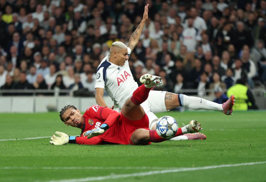 Villarreal's Luiz Junior scoring an own goal under pressure from Tottenham Hotspur's Richarlison.