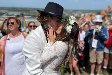 We just tied the knot at Glastonbury in front of 500 strangers – I wore a £27 Shein dress & we saved £20K on the DJ too 