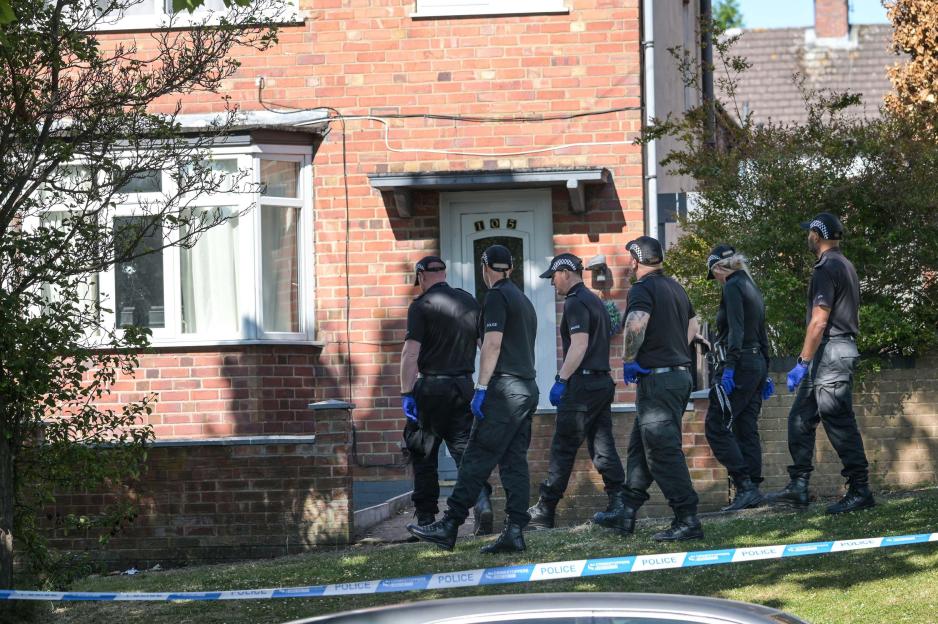 Woman rushed to hospital after being shot at home as cops launch urgent hunt for gunman
