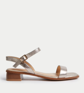Silver block heel sandals with ankle strap.