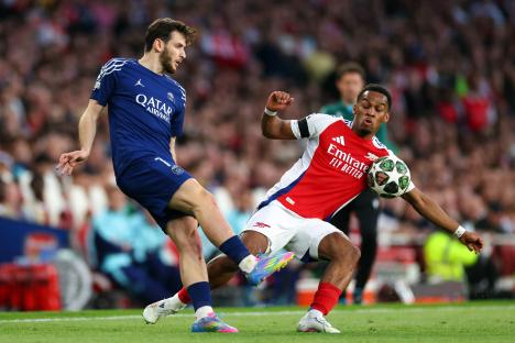 Soccer players vying for the ball.