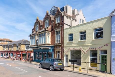 Seaview, Isle of Wight street scene with shops and a parked Mini Cooper.
