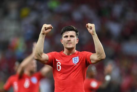 Harry Maguire celebrating an England victory at the World Cup.