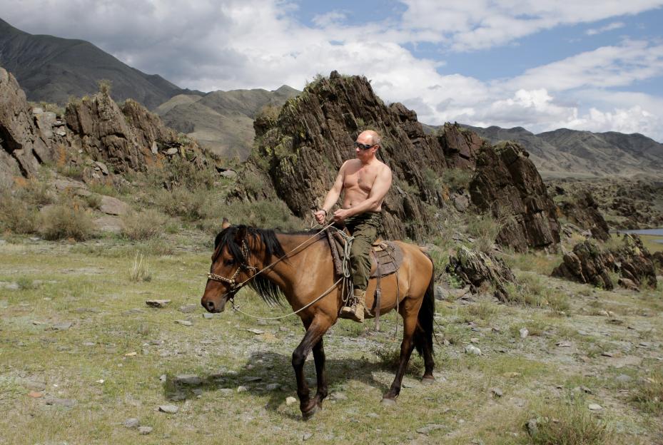 Russian Prime Minister Vladimir Putin riding a horse while on vacation.