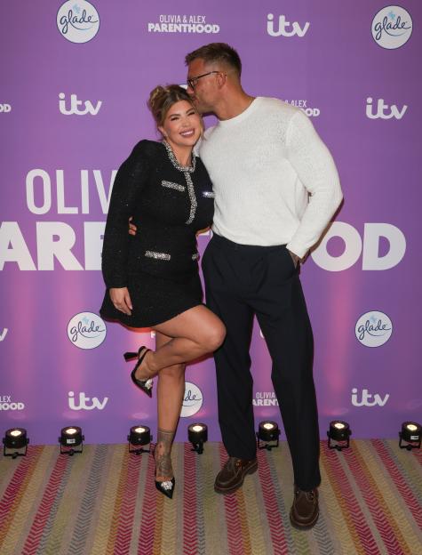 Olivia and Alex Bowen pose at the screening of their new series, "Olivia and Alex: Parenthood".