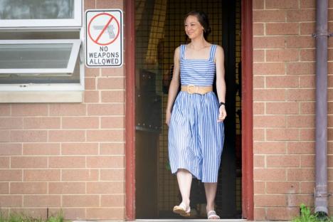 An image collage containing 1 images, Image 1 shows Molly Martens Corbett leaving a correctional facility