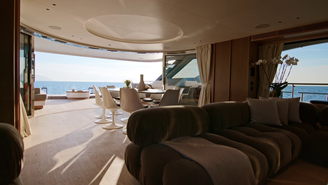Interior of a yacht with ocean view.
