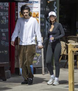 Cruz Beckham and his girlfriend Jackie Apostel holding hands while shopping.