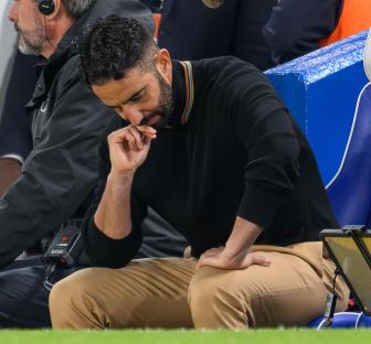 Manchester United manager Ruben Amorim sitting pensively.