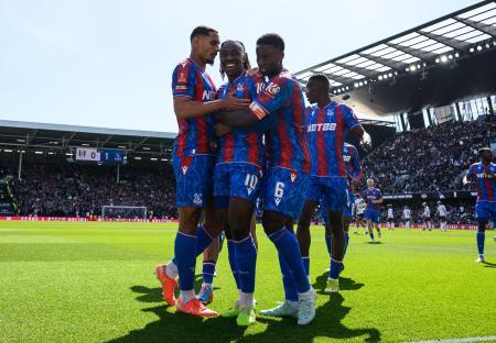 Crystal Palace soccer players celebrating a goal.