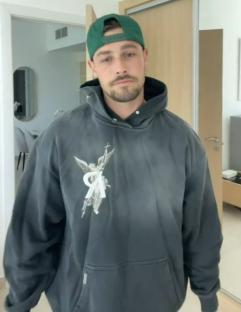Andrew Le Page in a dark gray hoodie, saying he's putting himself in timeout for getting excited over a girl again.