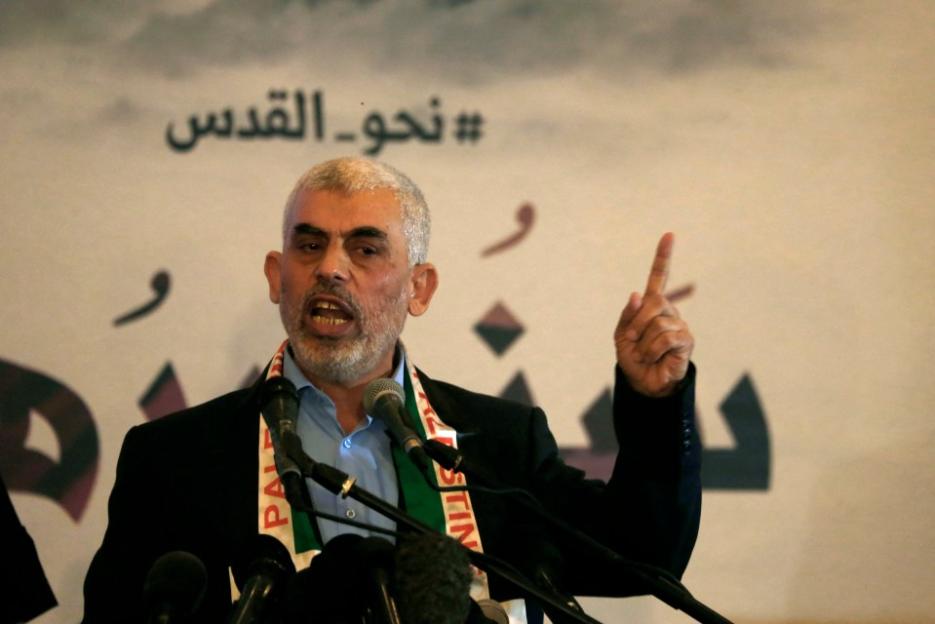Man speaking at a podium.
