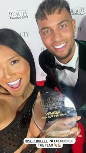Sophie Lee and Ouzy See at the Beauty Awards; Lee holds an Influencer of the Year award.