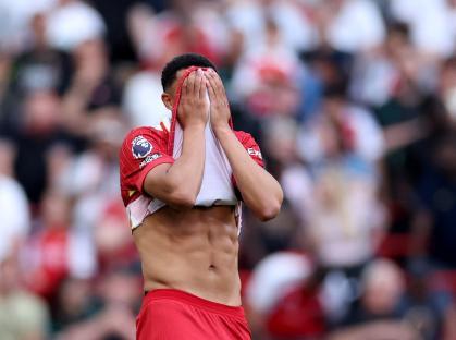 Trent Alexander-Arnold reacting during a soccer match.