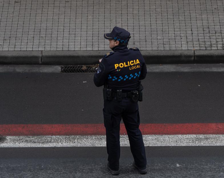 Policeman working and watching to the left side