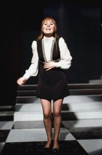 Lulu, Scottish singer, actress, and TV presenter, on stage.