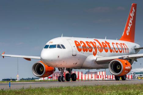 Plane passenger sparks emergency landing after convincing himself SNAKES were slithering on easyJet flight from Gatwick