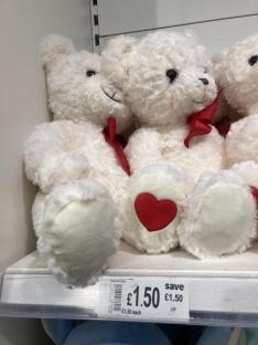 Two white teddy bears with red hearts on their paws. £1.50 each.