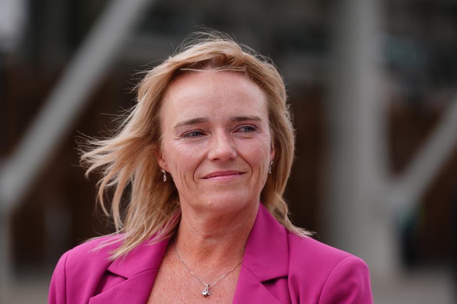 Photo of nurse Sandie Peggie outside the Scottish Parliament.